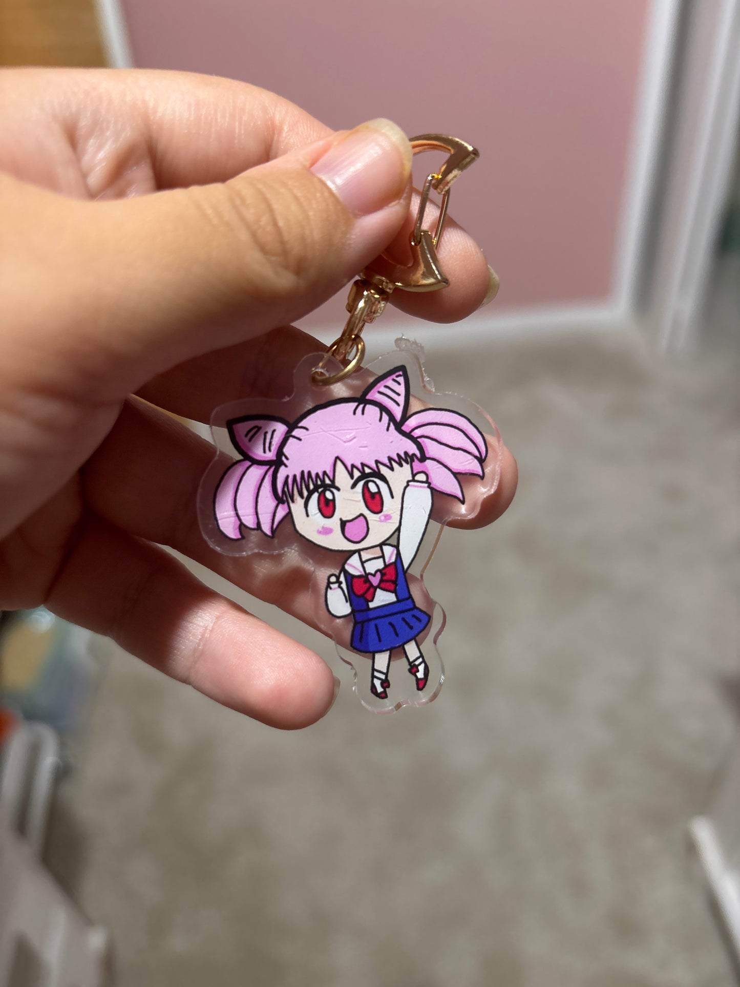 Hand Holding a cute acrylic charm of Chibiusa from Sailor Moon
